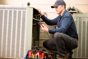 hvac-technicians-works-on-condenser